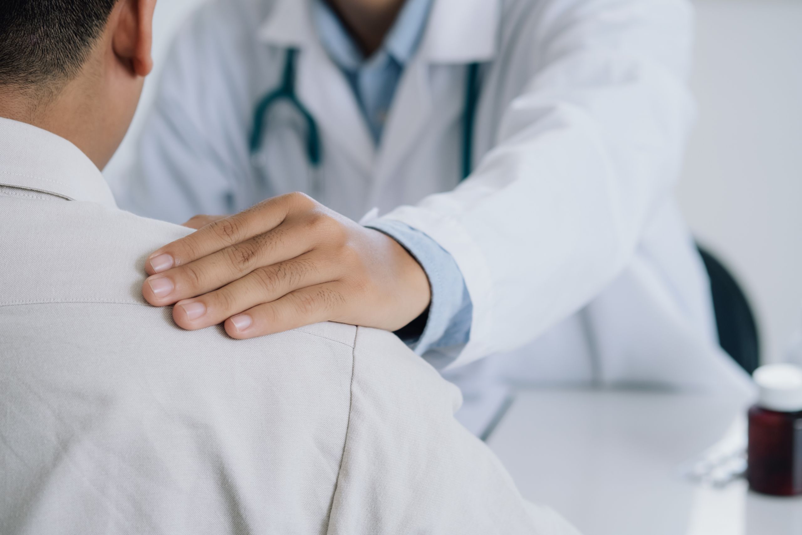 doctor speaking with male patient about depression medication