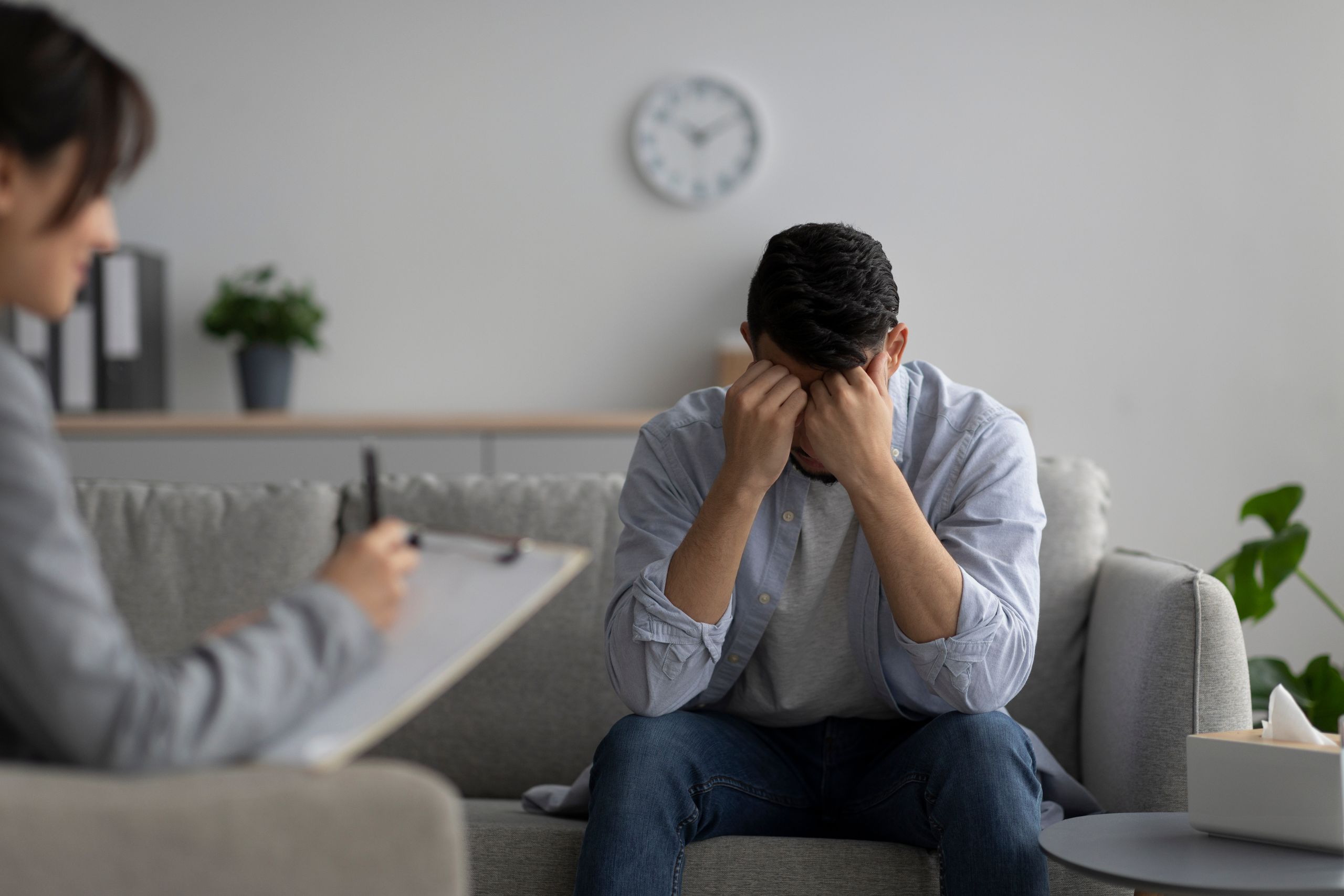 man struggling with depression in philadelphia asking his therapist if he can you check into a mental hospital for depression