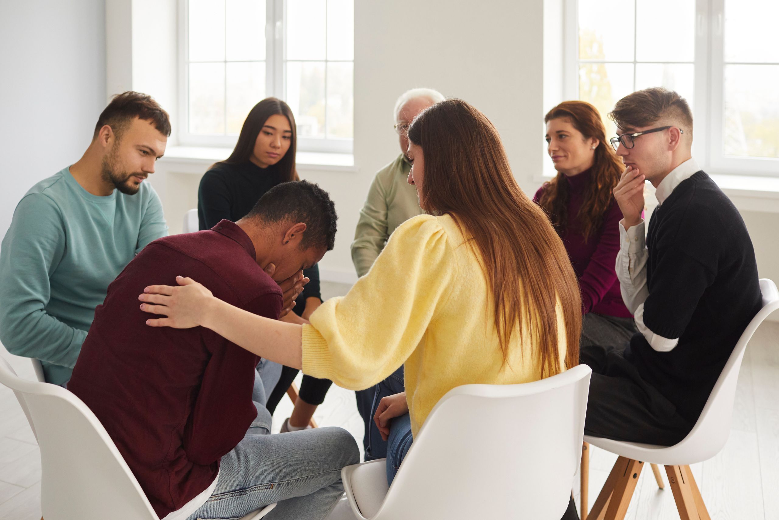 patient sitting in group at new mind wellness learning how to cope with high functioning anxiety