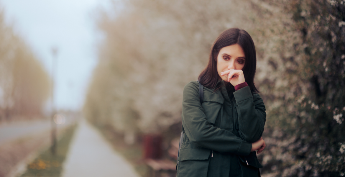 woman walking outside looking anxious struggling with thought disorder symptoms in Philadelphia