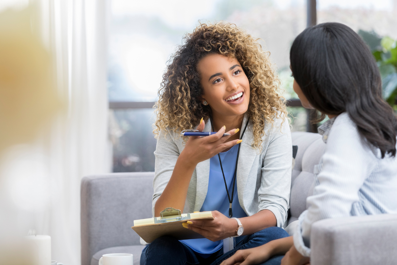 woman speaking to her client about What Is Pure OCD?